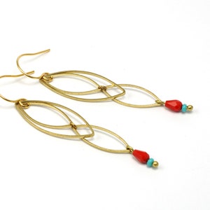 Earrings infinity with red pearl