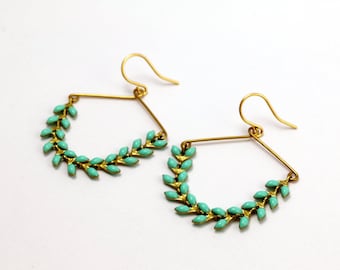 Earrings mint-colored swings