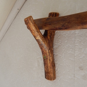 Gardinenstangenhalter aus Naturholz