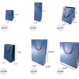 May include: Six different sizes of blue paper gift bags with blue rope handles and gold accents. The bags are labeled with their size number and measurements in inches.