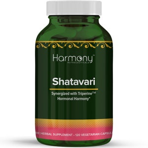 May include: A green bottle with a white lid labeled "Harmony Nutraceuticals Shatavari Synergized with Triperine&trade; Hormonal Harmony*" and "120 Vegetarian Capsules".