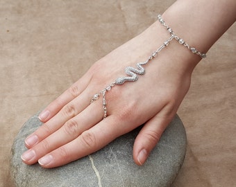 THUEBAN - Handschmuck mit Schlange in Silber (Platiniert)