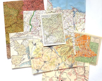 May include: A collection of vintage maps in various colors and sizes, including a map of Germany, a map of the Harz region, and a map of a city. The maps are printed on paper and have a worn, aged look.