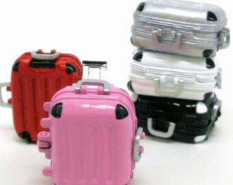 barbie doll with suitcase