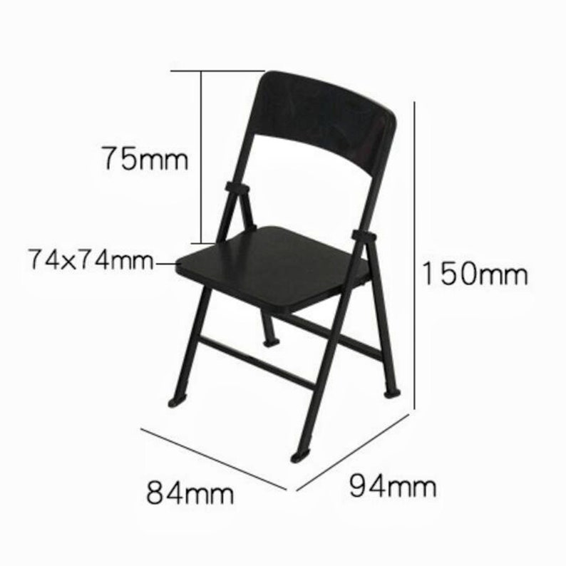 May include: Black folding chair with a 74x74mm seat, 75mm back height, 150mm overall height, 84mm width, and 94mm depth.