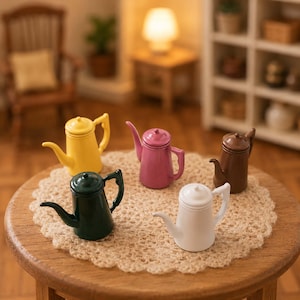 May include: A collection of miniature ceramic teapots in various colors: yellow, pink, brown, white, and dark green. Each teapot has a spout and handle. They are arranged on a small, round wooden table with a lace doily.