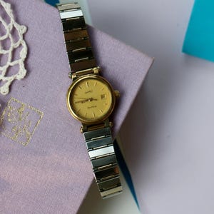 Vintage Eberhard Swiss Watch: Gold Tone Two-Tone Bracelet, Date Display