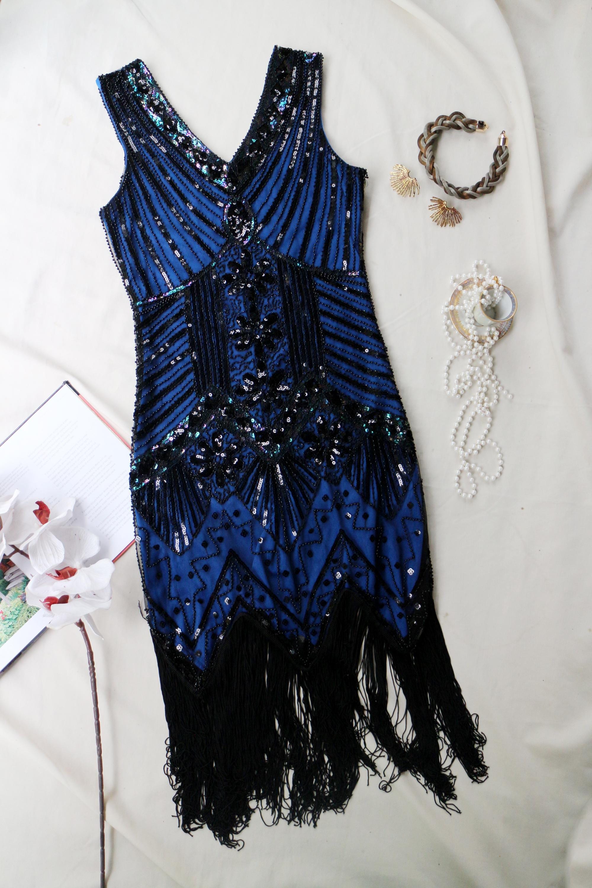 gatsby blue dress exuding sheer wow factor