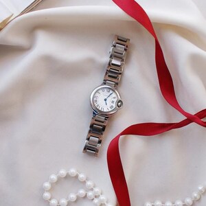 Brand Swiss watch icon cartier ballon bleu de 31 mm