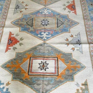 Hand-Knotted Turkish Oushak Rug: Ivory & Blue Wool Floral Rug