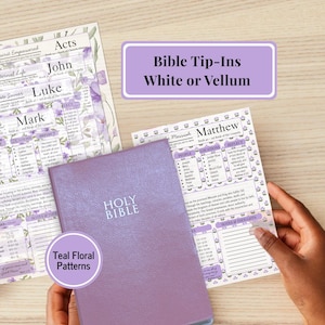 May include: A purple Holy Bible book placed over printed Bible tip-in sheets featuring floral designs and text including Matthew, Mark, Luke, John, and Acts. The sheets contain sections for people, locations, and notes with purple accents.