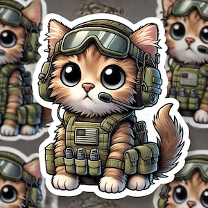 May include: A sticker featuring a cartoon cat in a military uniform. The cat has large eyes, wearing a helmet, goggles, headset, and a tactical vest with an American flag patch. The cat is brown and white with a fluffy tail.