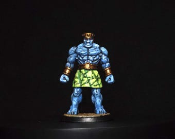 Miniatura professionale dipinta di un grande golem di pietra – Miniature Reaper – Mostro fantasy RPG dettagliato e luminoso