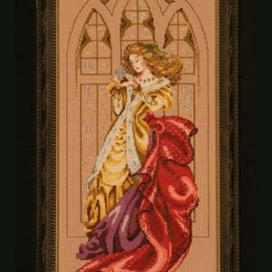 May include: A woman in a gold and purple dress with a red cloak stands in a gothic archway. She is holding a small bird in her hand. The background is a light brown color.