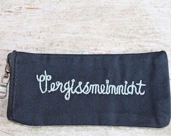 Pill bag made of fabric with embroidery "Forget-me-not", dark blue, zipper, 5.5 x 12 cm