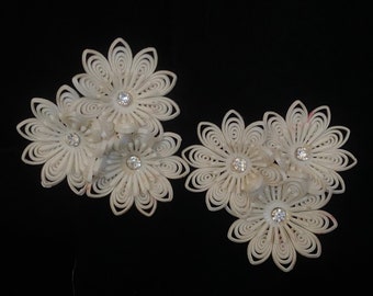 Vintage 1950’s white rubber flower cluster clip on earrings with rhinestones