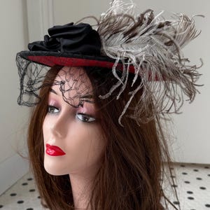 Vintage 1940’s red and black straw hat with big feather, by Maxine