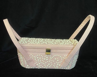 Vintage 1950’s pink linen structured handbag with white dots and mirror inside