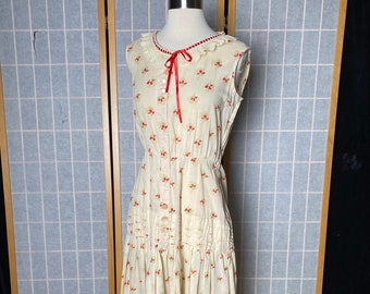 Vintage 1950’s cream and red floral summer dress with lace and ruffles, size medium