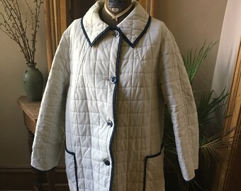 Vintage 1970's White puffy Quilted Winter Coat with blue piping, size medium