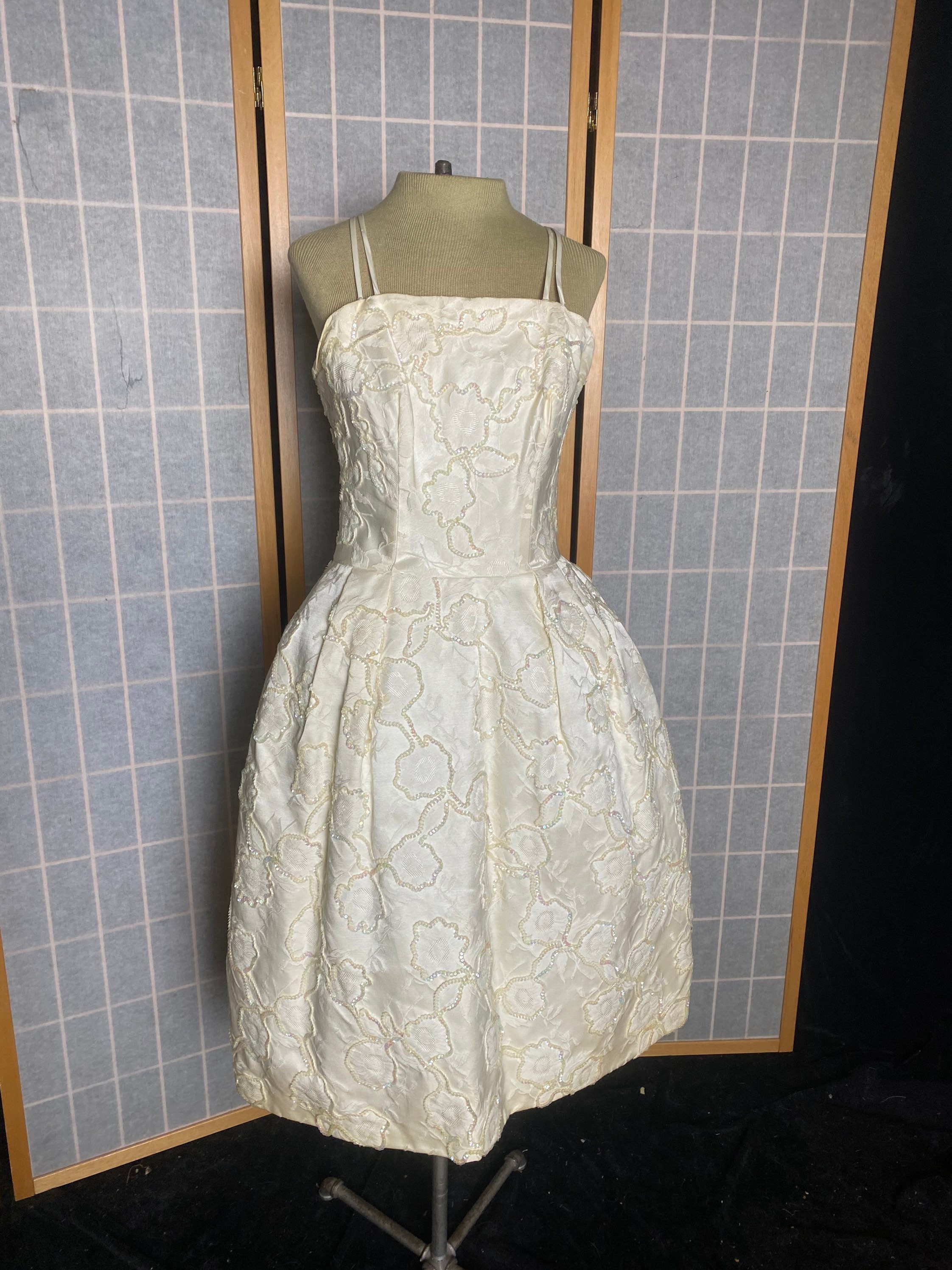 white brocade dress