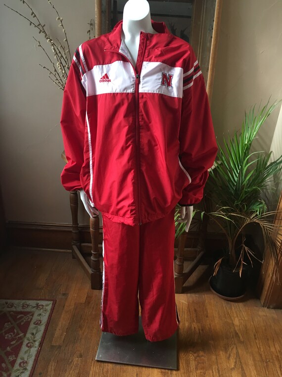 red windbreaker outfit