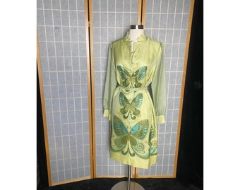 Vintage 1960’s green Alfred Shaheen dress with sheer sleeves and blue butterflies, size medium