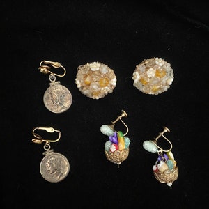 Three sets of vintage clip on and screw back earrings, United States coin, fruit basket and floral bouquet