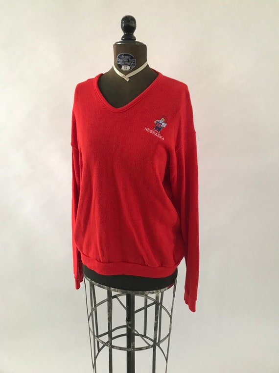 Vintage 1980s Red sweatshirt Nebraska mascot long… - image 1