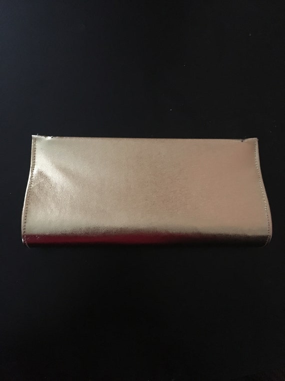 Gold vintage clutch. Gem