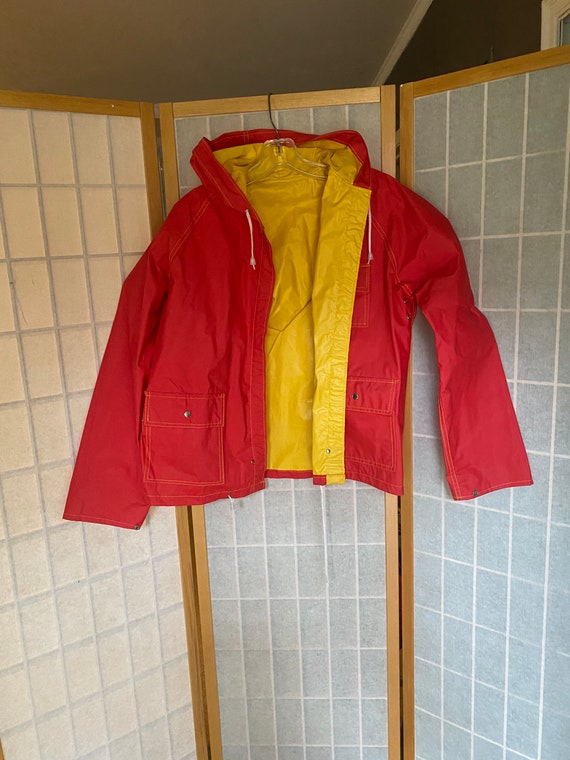 Vintage 1970’s red and yellow reversible rain coat