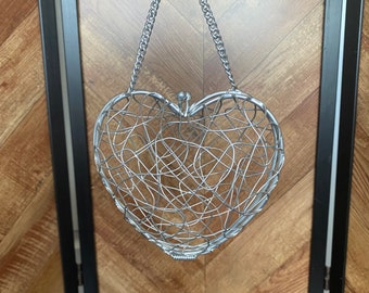 Piccola mini borsa a mano in metallo a forma di cuore a sbuffo vintage degli anni '80