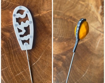Vintage antique celluloid hat pin, orange and white