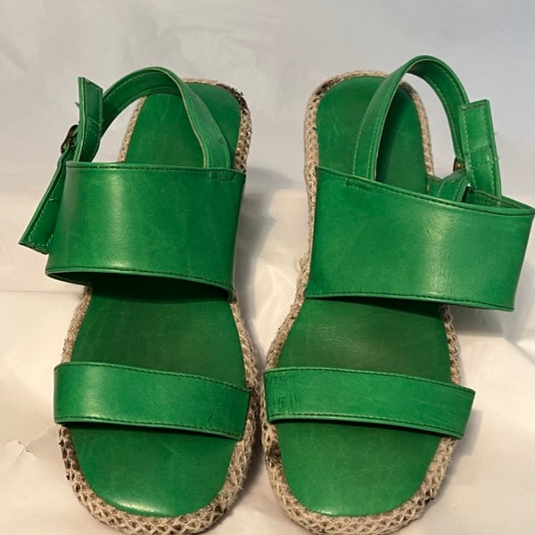 Vintage 1970's green and tan sandals.  Buckle at ankle, wedge heel.  Woven trim. Size 9 womens.