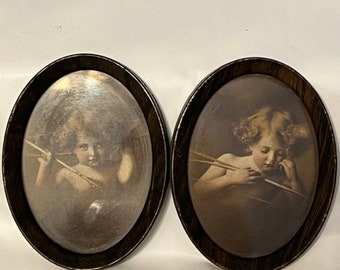 Alte Parkinson Drucke von Cupid Awake & Cupid Asleep. Kleine aufgesetzte ovale Rahmen.