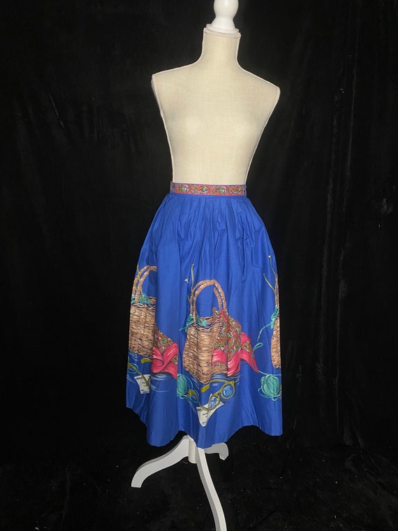Vintage 1950’s blue circle skirt with novelty sewi
