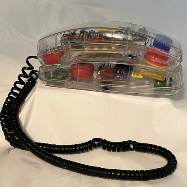 Vintage 1980's colorful clear Conair telephone with black cord