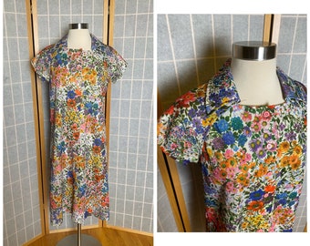 Vintage 1960’s 1970’s colorful rainbow floral short sleeve polyester dress, size large