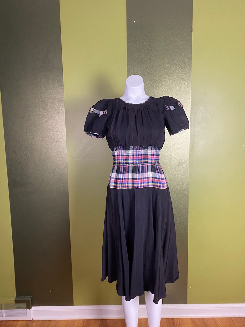 Vintage 1940s black dress with colorful plaid waist and puffy sleeves, size xs small image 1