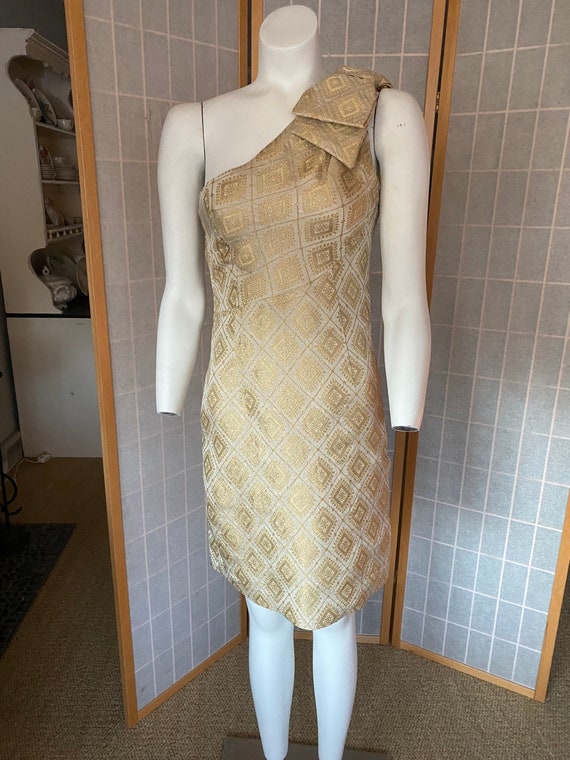 Vintage 1980’s gold dead stock one shoulder cockta
