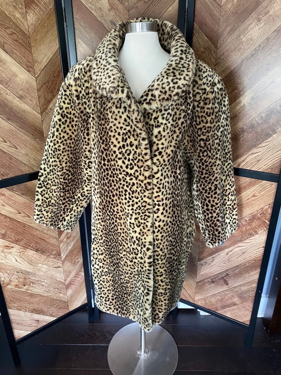Vintage 1980’s plush cheetah print coat, dead stoc