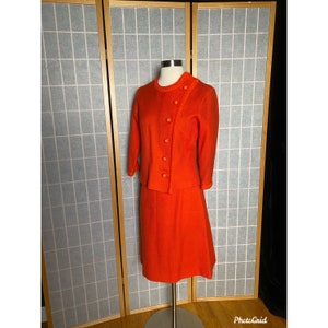 Vintage 1960’s orange knit mod skirt suit with bubble buttons, size small