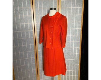 Vintage 1960’s orange knit mod skirt suit with bubble buttons, size small