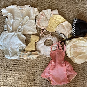 Vintage lot of baby clothes, knit socks, bonnets, outfits, 1950’s