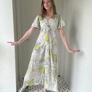 Vintage 1970’s white, green and blue floral flutter sleeve maxi dress, size medium