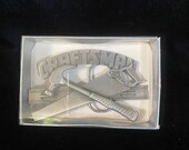Vintage 1990 s silver pewter craftsman belt buckle, with level, saw and hammer