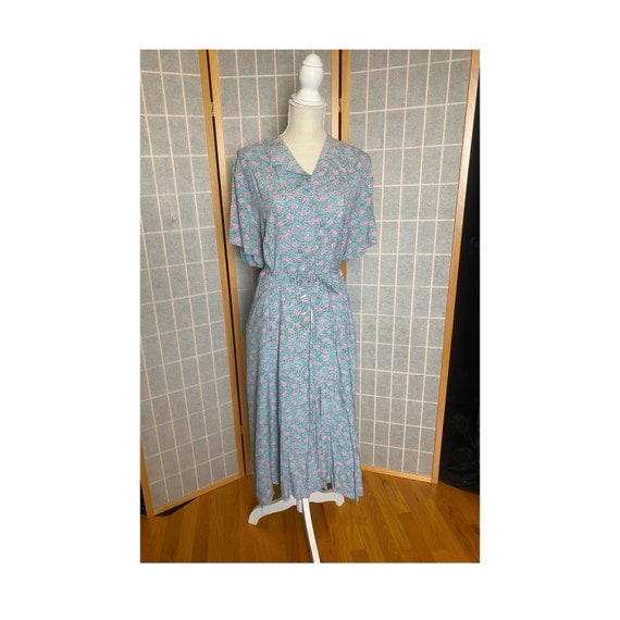 Vintage 1950’s blue short sleeve day dress with pink and black pattern, size XL