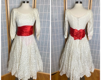 Vintage 1950’s white lace party dress with red satin ribbon, size small