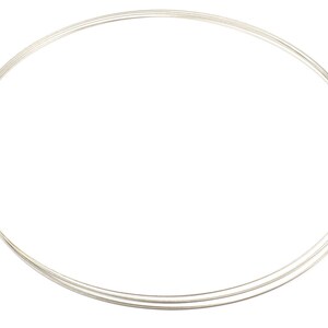 May include: A silver-colored necklace with three thin, circular strands. The necklace has a simple design and a clasp closure. The jewelry is displayed against a white background.