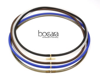 1 rubber strap Ø 4 mm, 50 or 47 cm long in royal blue, color selectable, with gold-colored metal snap closure
